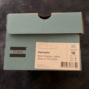 Tom’s Youth size 12 Mint Holiday Lights Glow in the Dark. Never used.